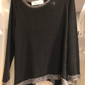 Black long sleeved shirt.